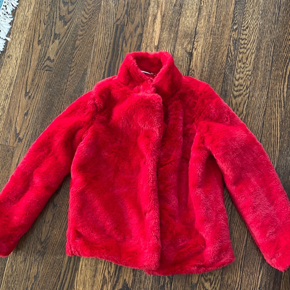 NEW Red faux fur jacket, size small. Never worn. Sassy and spices up any outfit